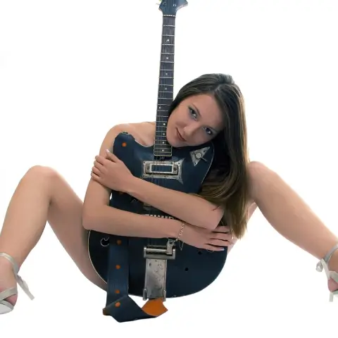 nude woman with guitar